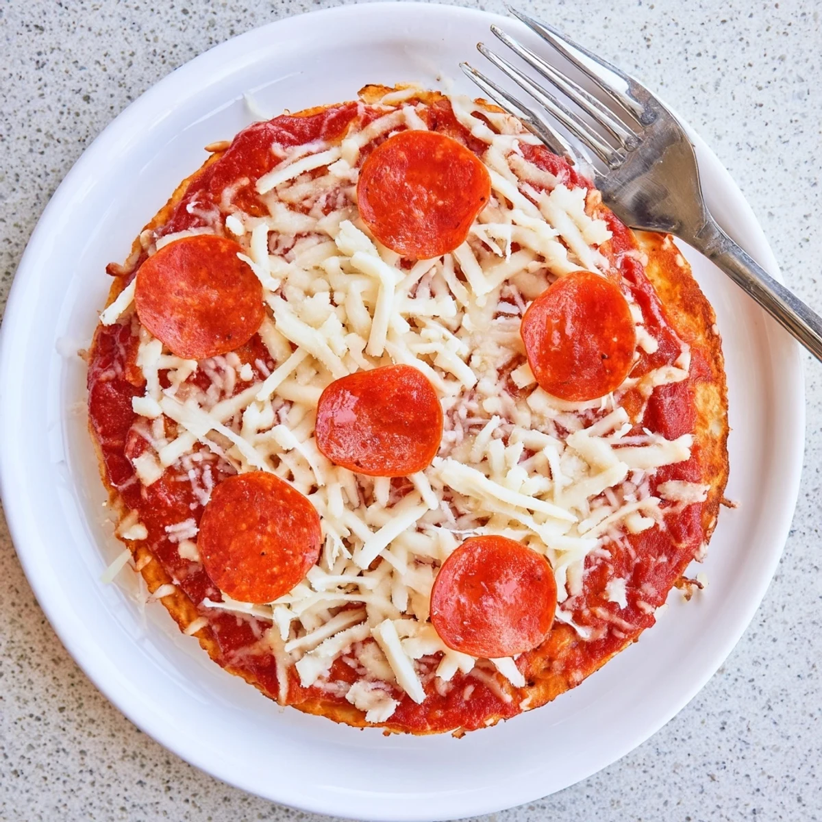 Sliced Pizza Hut Pan Pizza revealing chewy interior under generous mozzarella and toppings