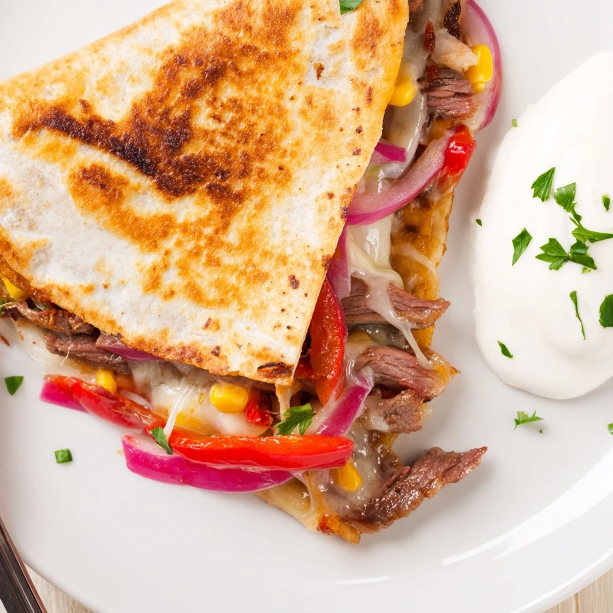 Crispy Sweet Savory Beef Quesadillas stuffed with tender beef, sweet corn, melted cheese
