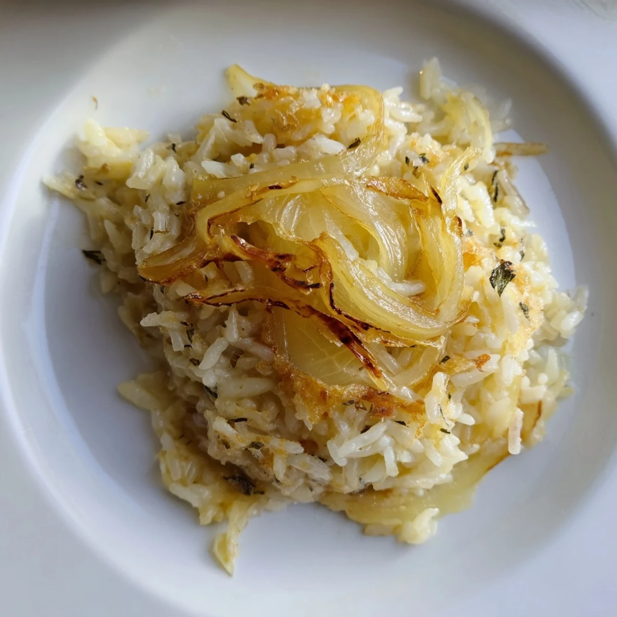 French Onion Soup Rice bubbling with melted Gruyère, caramelized onions, ready to serve